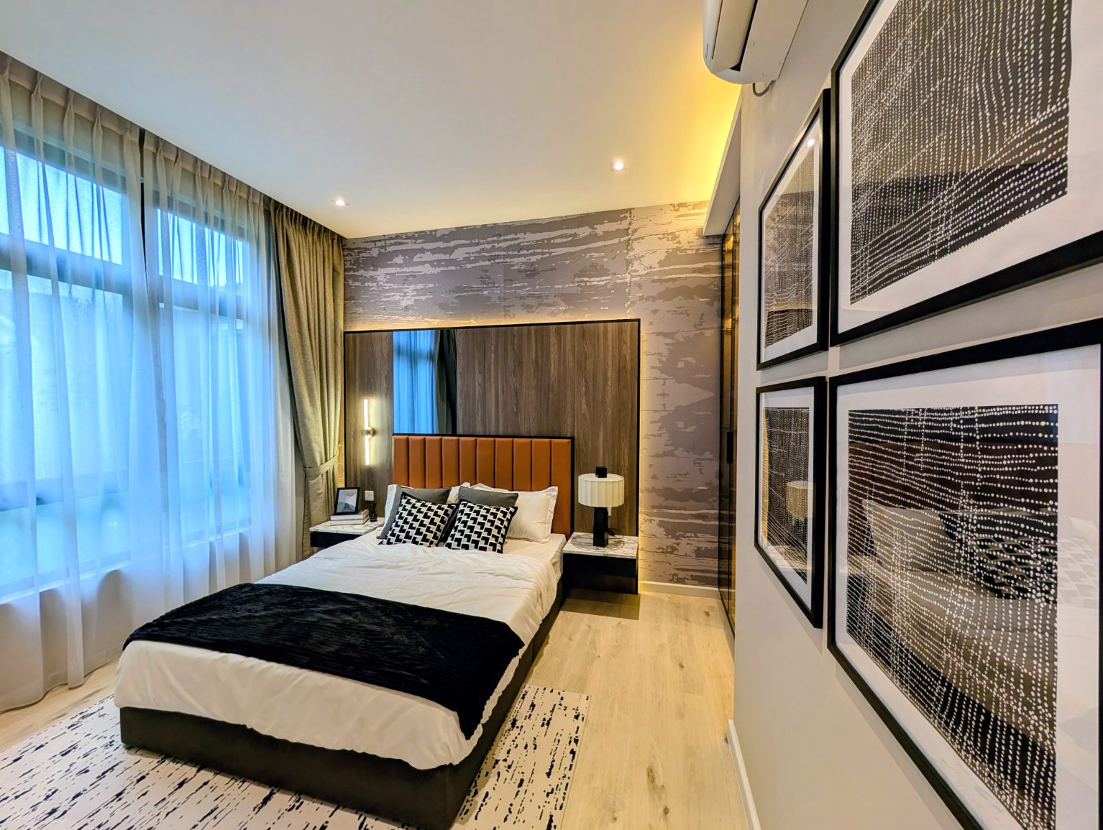 Bedroom with timber feature wall and framed art