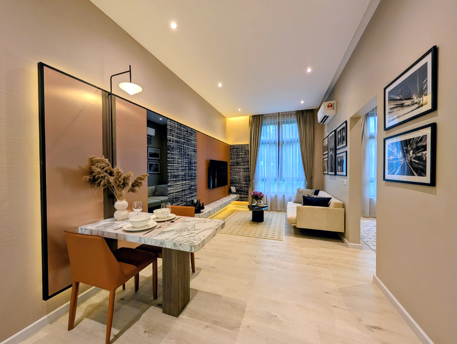 Dining table and living area in the show unit