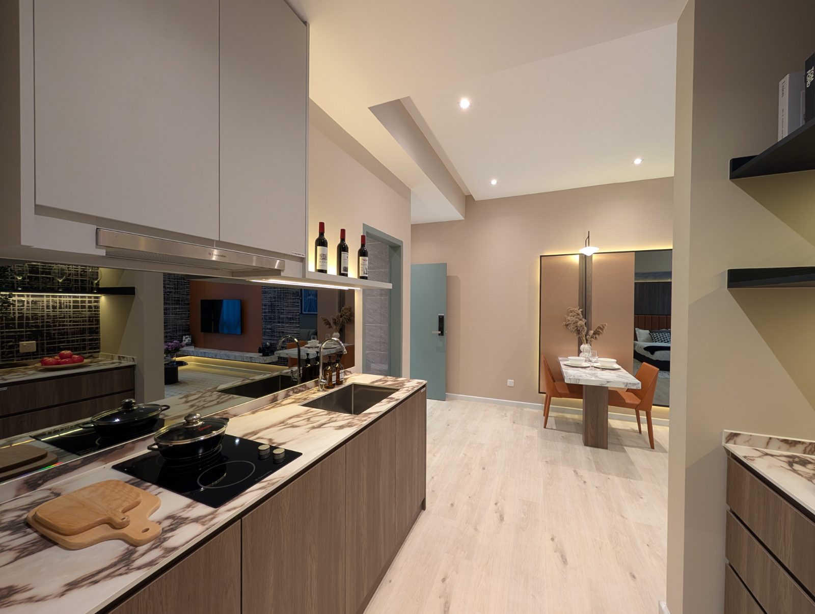 Kitchen island and dining beyond in the show unit